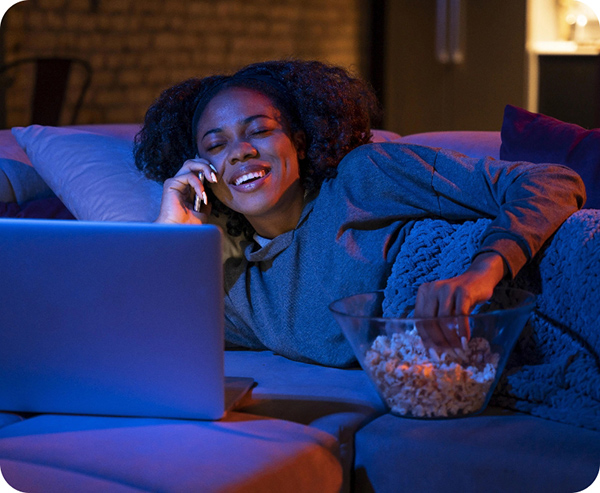 econet-medium-shot-woman-eating-popcorn